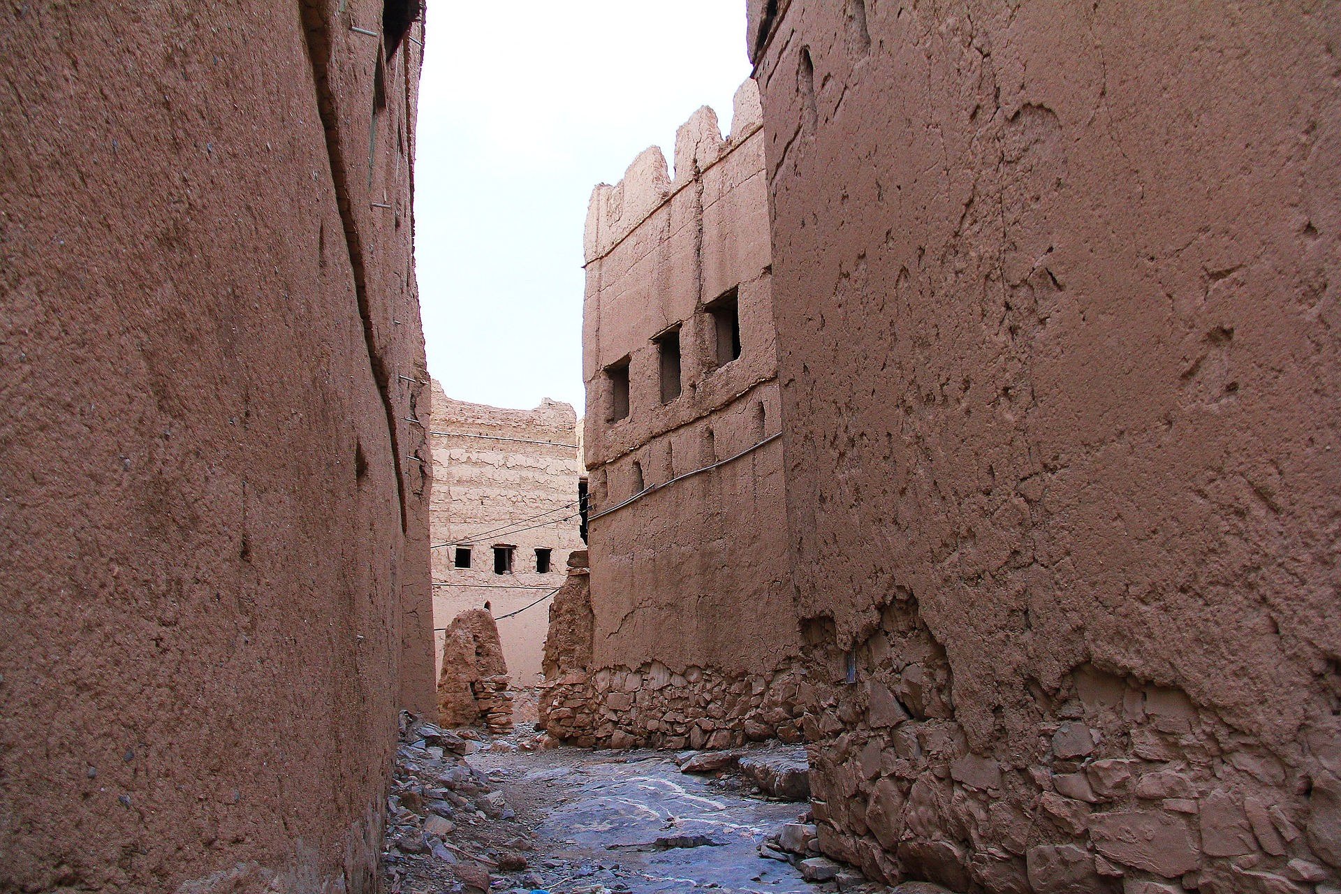 Old narrow street with deteriorating buildings