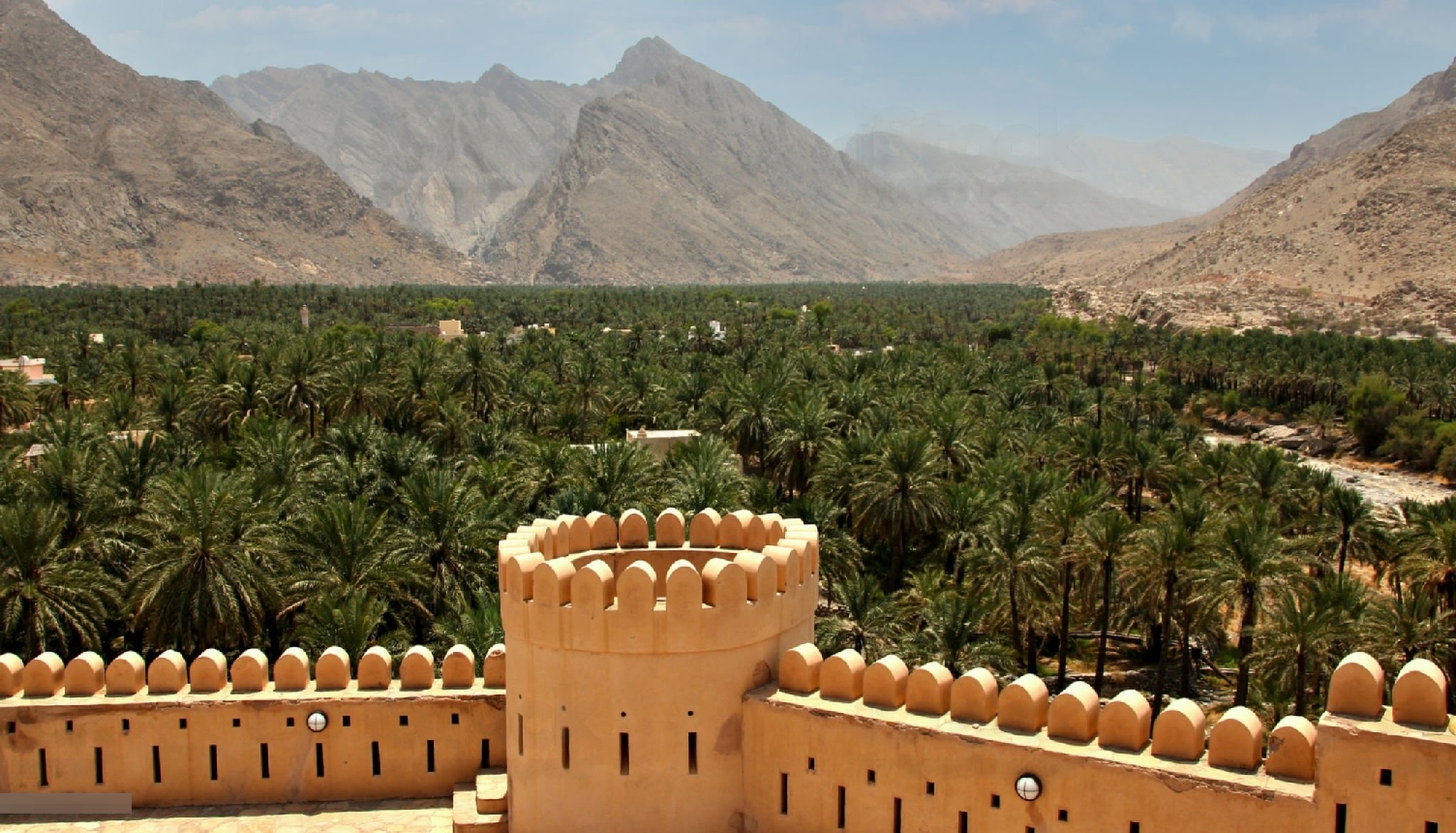 View of Nizwa Fort and surrounding mountains.